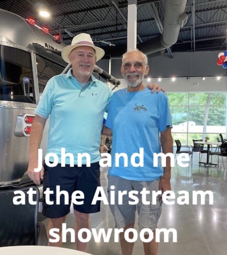 John with a friend at the Air stream showroom