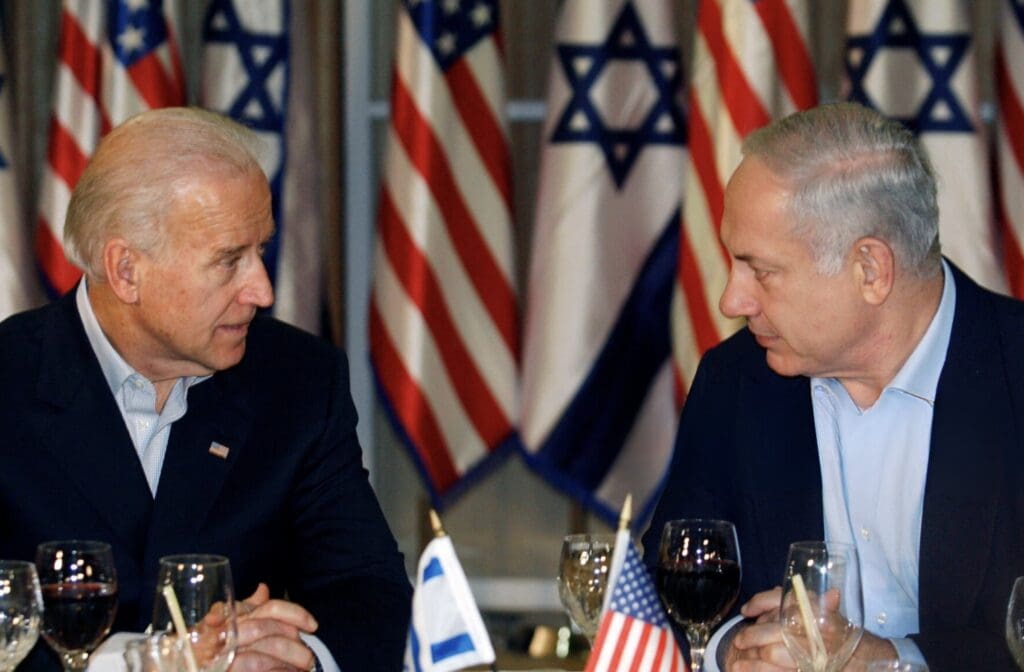 Joe Biden and Ehud Barak in discussion.