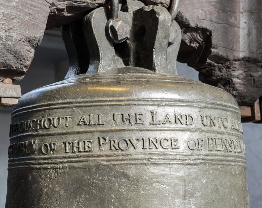 The Liberty Bell with a close up of the inscription.