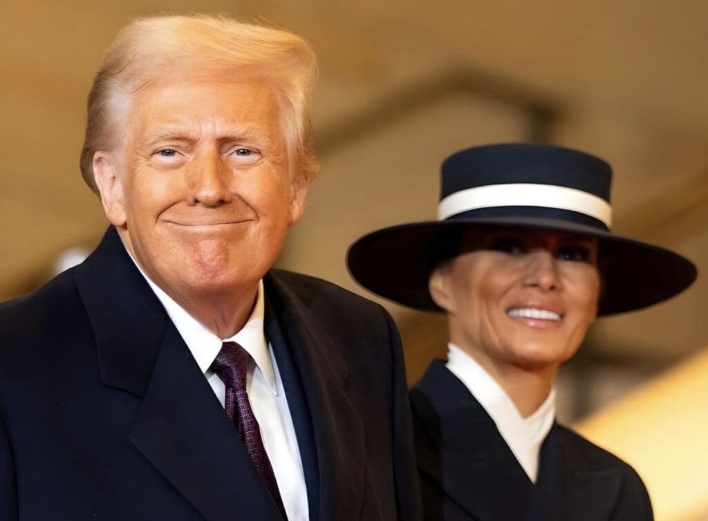 Smiling couple in formal attire.