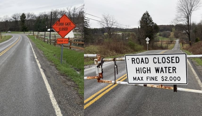 Road closed signs due to high water.